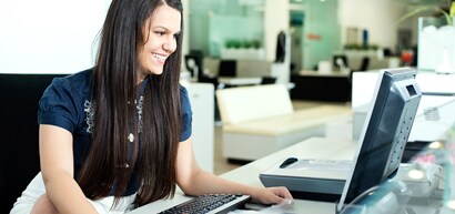 Woman at computer desk