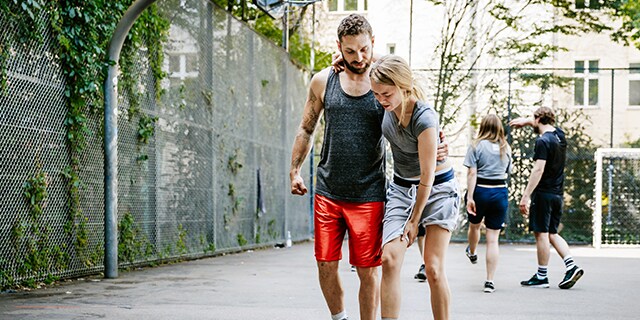 Couple helping each other after sport injury