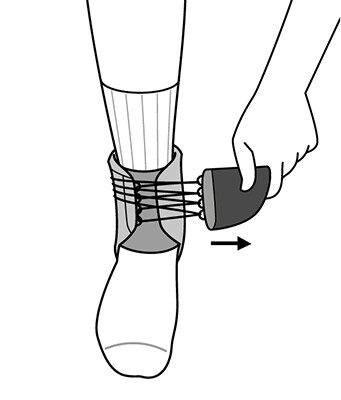 Adjusting tab on left side of ankle and strap under heel for desired compression and fit.