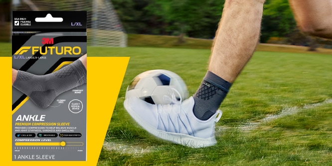 FUTURO Premium ankle Compression Sleeve on a person playing soccer.
